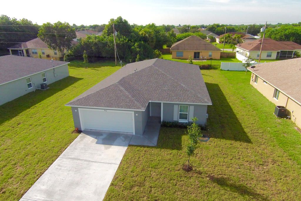 Photo of 1802 SW Davis Street, Port Saint Lucie, FL 34953 (MLS # R10958466)