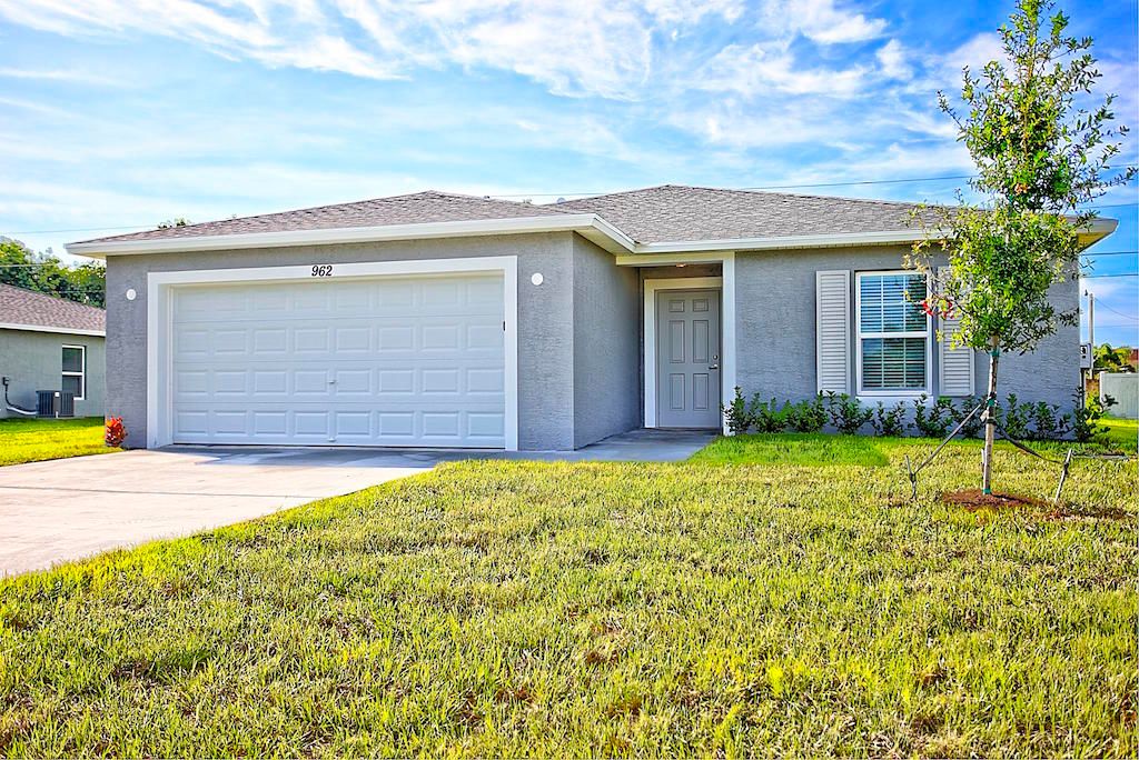 Photo of 1802 SW Davis Street, Port Saint Lucie, FL 34953 (MLS # R10958466)