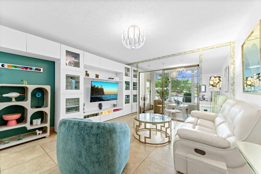 Prepare to be captivated by this truly stunning and unit in the highly sought-after Hawaiian Gardens. This isn't just a home; it's a front-row seat to paradise, offering amazing water views from every vantage point! Located directly on the first floor, you'll enjoy effortless access to the beautifully maintained backyard, making outdoor living a breeze. Inside, the home shines with a meticulously remodeled kitchen featuring elegant white cabinets that extend all the way to the ceiling, complemented by a beautiful backsplash. Experience enhanced security and peace of mind with new hurricane-resistant windows throughout, and included is a versatile Florida Room. Every detail in this unit has been updated with great taste, from the gleaming tile floors that flow seamlessly throughout, to the stylishly updated bathrooms. This home is truly a turn-key opportunity, radiating brightness and modern appeal. Beyond your private oasis, Hawaiian Gardens a vibrant, well-maintained 55+ community offering a wealth of resort-style amenities designed for an active and engaging lifestyle. Enjoy the heated pool, a fully equipped gym, shuffleboard courts, and serene walking paths around picturesque lakes. Perfectly situated, you're just minutes from fine shopping, diverse dining, major highways, and all the conveniences that make this area so desirable. This beautiful unit is a rare find and a must-see!