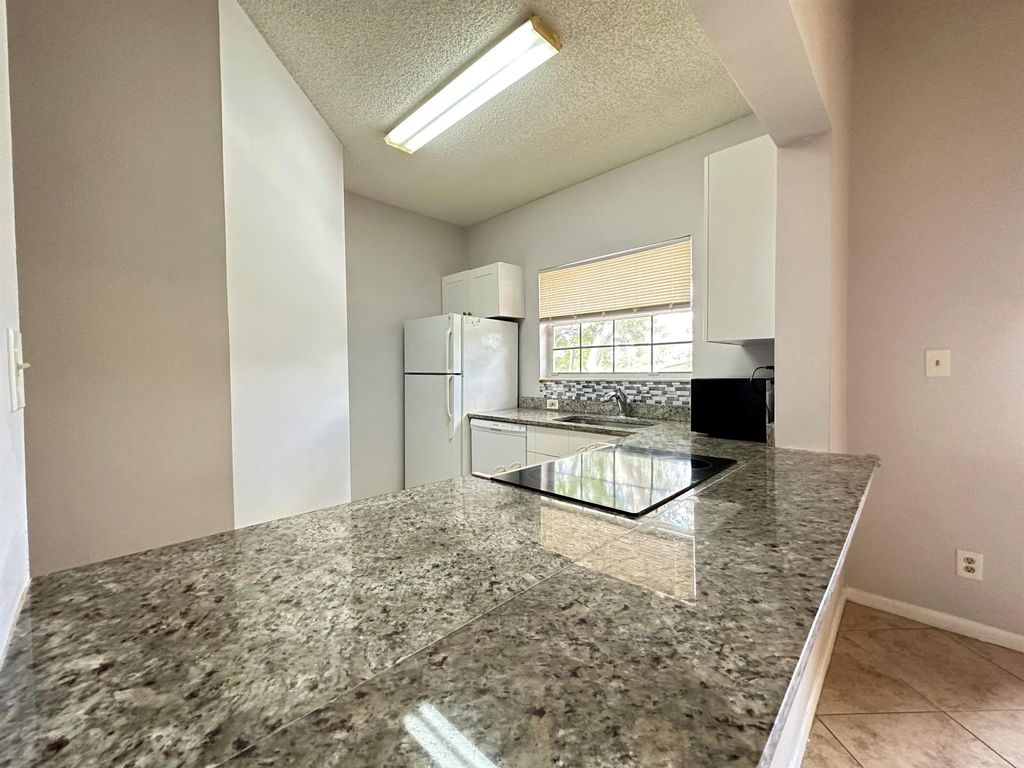 Photo of 840 Cypress Park Way #D, Deerfield Beach, FL 33064 (MLS # R11073637)