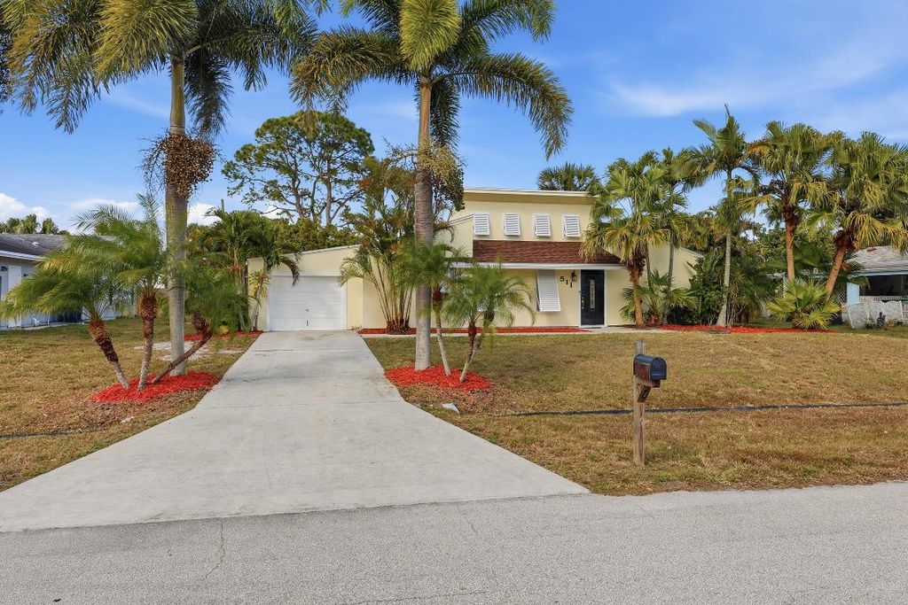 Photo of 511 SW Comet Terrace, Port Saint Lucie, FL 34953 (MLS # R11156436)