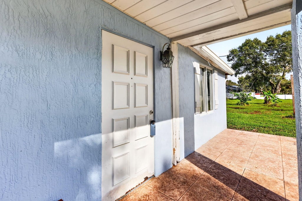 Photo of 3171 Dame Road, Fort Pierce, FL 34981 (MLS # B26087073)