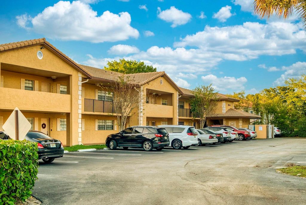 Photo of 3030 Coral Springs Dr #108, Coral Springs, FL 33065 (MLS # F10541916)