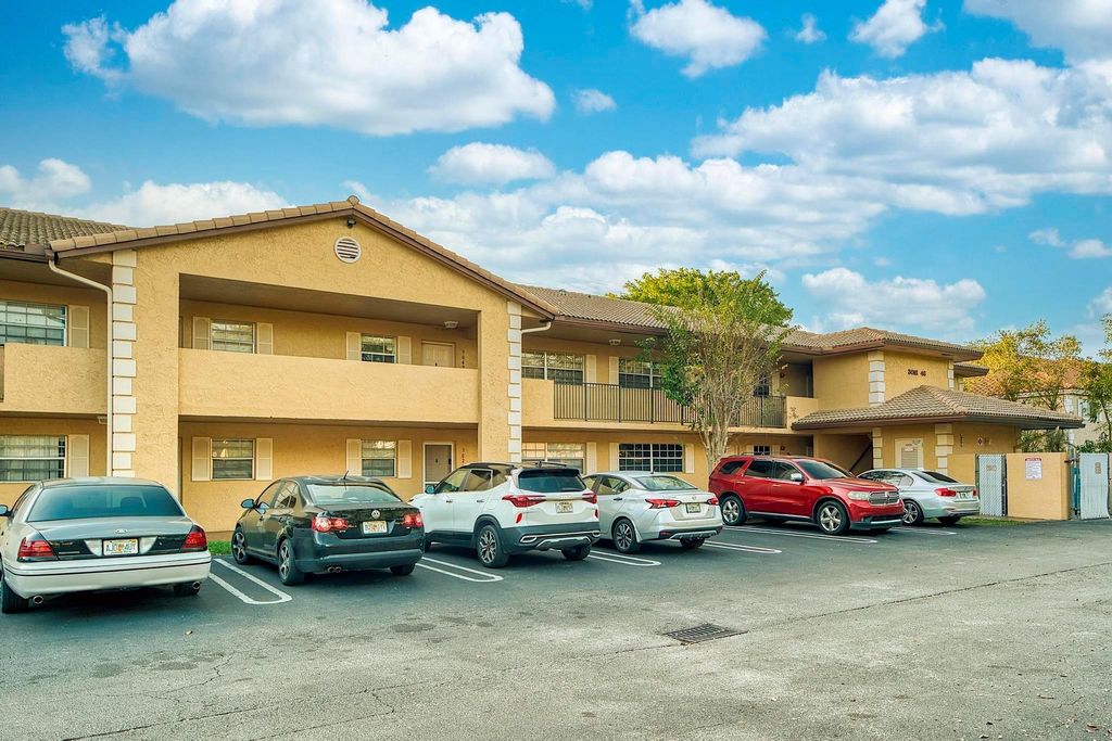 Photo of 3030 Coral Springs Dr #108, Coral Springs, FL 33065 (MLS # F10541916)