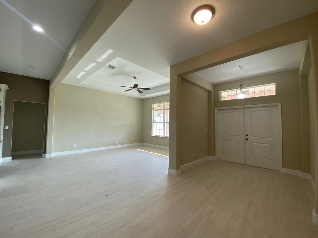 Photo of 1050 SW Consolata Avenue, Port Saint Lucie, FL 34953 (MLS # F10430539)