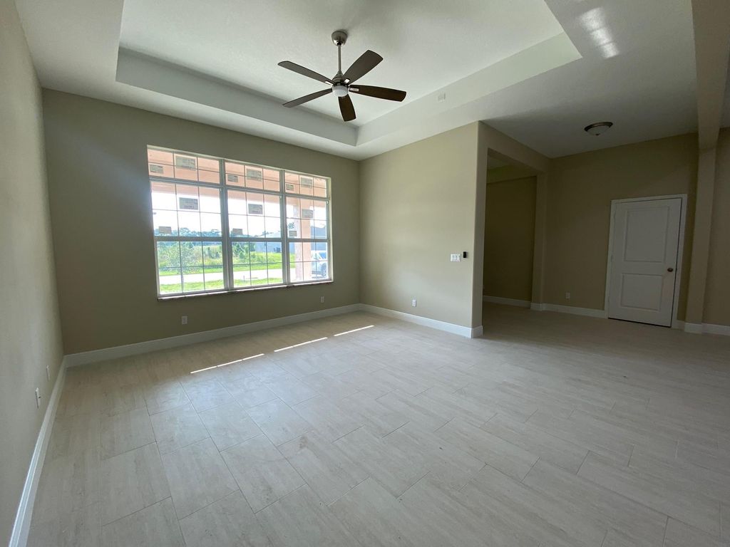 Photo of 1050 SW Consolata Avenue, Port Saint Lucie, FL 34953 (MLS # F10430539)
