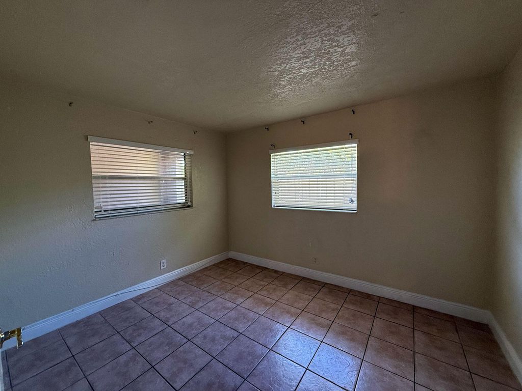 Photo of 5720 NW 15th Street, Lauderhill, FL 33313 (MLS # B26002427)