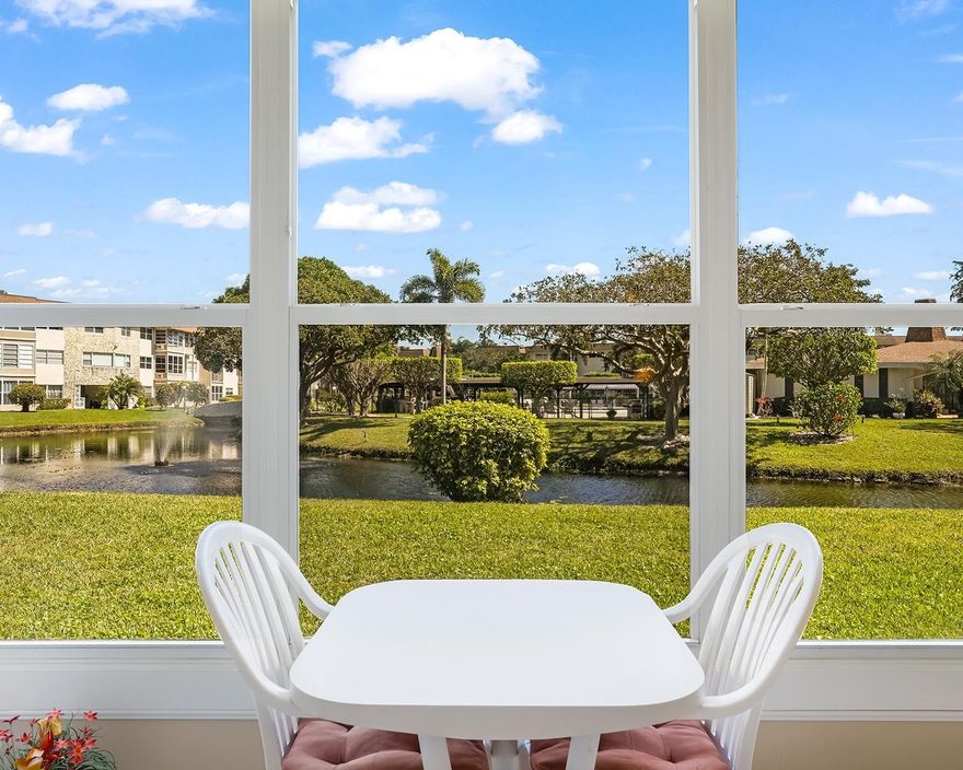 Bright, light 1st-floor condo in 55+ Umbra Gardens, Hawaiian Gardens, Lauderdale Lakes. Enjoy stunning canal and clubhouse views from the enclosed balcony with high-impact glass. Ceramic and tile flooring throughout, white kitchen cabinetry, and an updated bathroom. AC from 2011 and tankless water heater installed in 2024. Building roof recently updated (7-8 years). Move-in ready—come see this special unit today and make it your own.