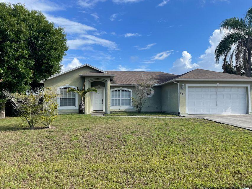 Photo of 501 SE Sweet Avenue, Port Saint Lucie, FL 34983 (MLS # R11082606)