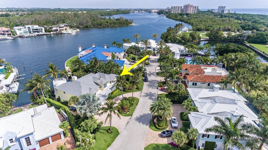 Boca Raton Florida. beach, golf, parks, shopping & dining. Intracoastal views 80 Feet of WATERFRONT 5 bed/5.1 bath, custom built SRD home. Watch gorgeous sunsets from your west-facing back patio. QUIET & PRIVATE no-wake zone, 2 floating docks & room for a boat. Walk-in wine cellar, large eat-in kitchen & island, billiards parlor, bar & wrap-around balcony. Brazilian hardwood, crown molding and custom details throughout. 3 car garage. Nestled  in Sun & Surf. Tropical, lush landscaping provides privacy. Location offers a dream lifestyle; golf in the morning, beach strolls in the afternoon & kayaking in the evening.