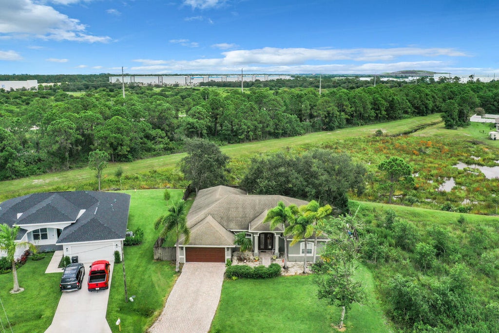 Photo of 5653 NW Krin Court, Port Saint Lucie, FL 34986 (MLS # R11017013)