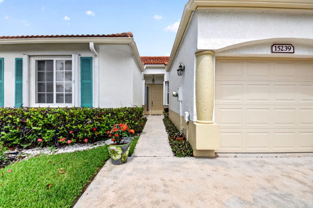Photo of 15239 Ixora Road, Delray Beach, FL 33484 (MLS # B26036127)