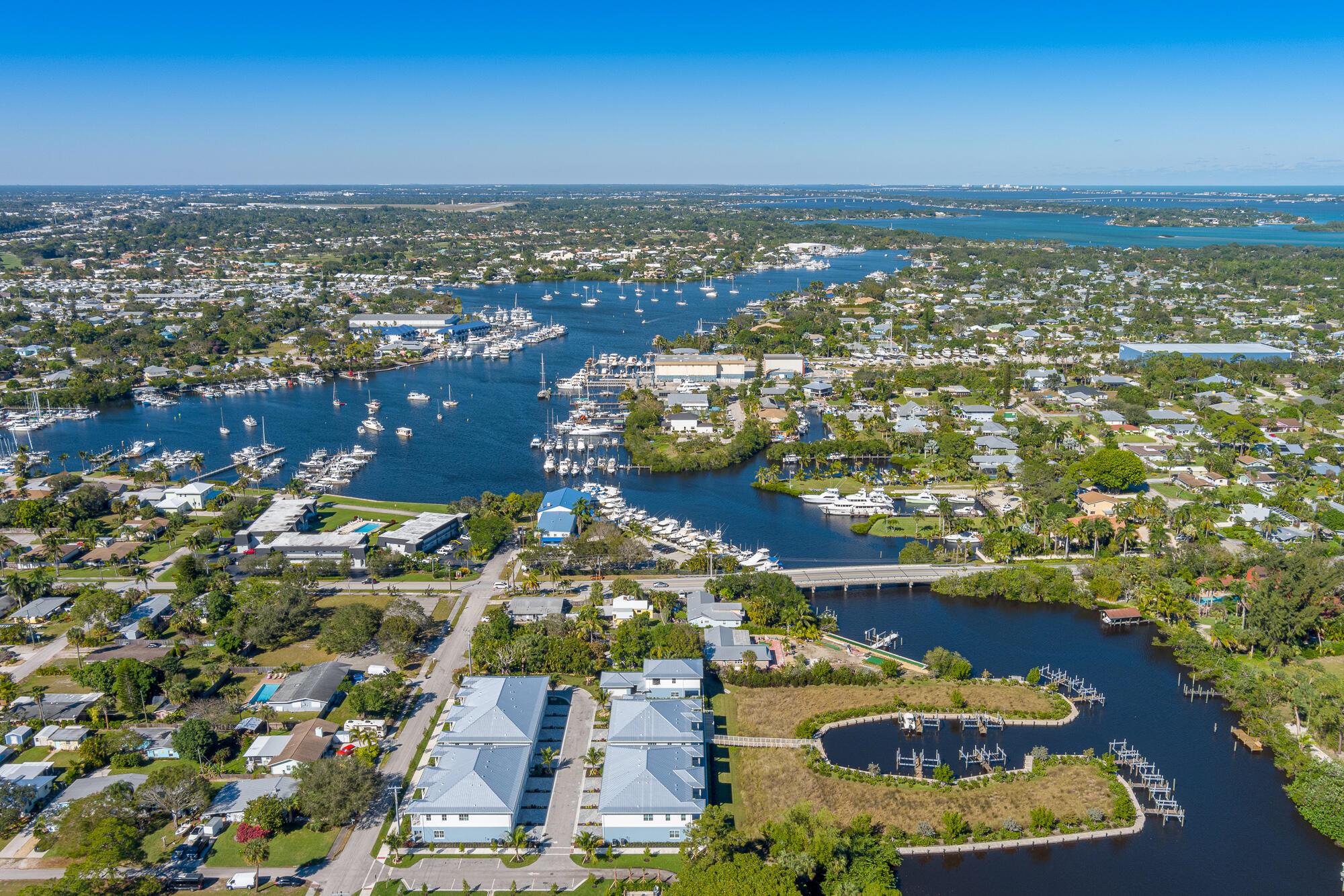 Waterfront Unit! New Luxury Waterfront Townhomes with Private Dock & Lift in Stuart, FL Welcome to the ultimate South Florida boating lifestyle--where luxury, convenience, and adventure meet. These new coastal-inspired townhomes are designed for the buyer who wants instant access to the water and all the fun it brings. Imagine stepping outside your door, hopping on your boat, and cruising to the Stuart Sandbar, waterfront restaurants, or world-class fishing within minutes. These 3 bedroom, 2.5 bath homes feature custom cabinets, quartz countertops, large format porcelain tile on 1st floor, luxury vinyl plank on 2nd floor, frame-less glass showers, designer inspired shower tile and mosaic Furnished or unfurnished Deeded Dock w/ 10,000 lb Boat Lift (Required separate purchase $169k)