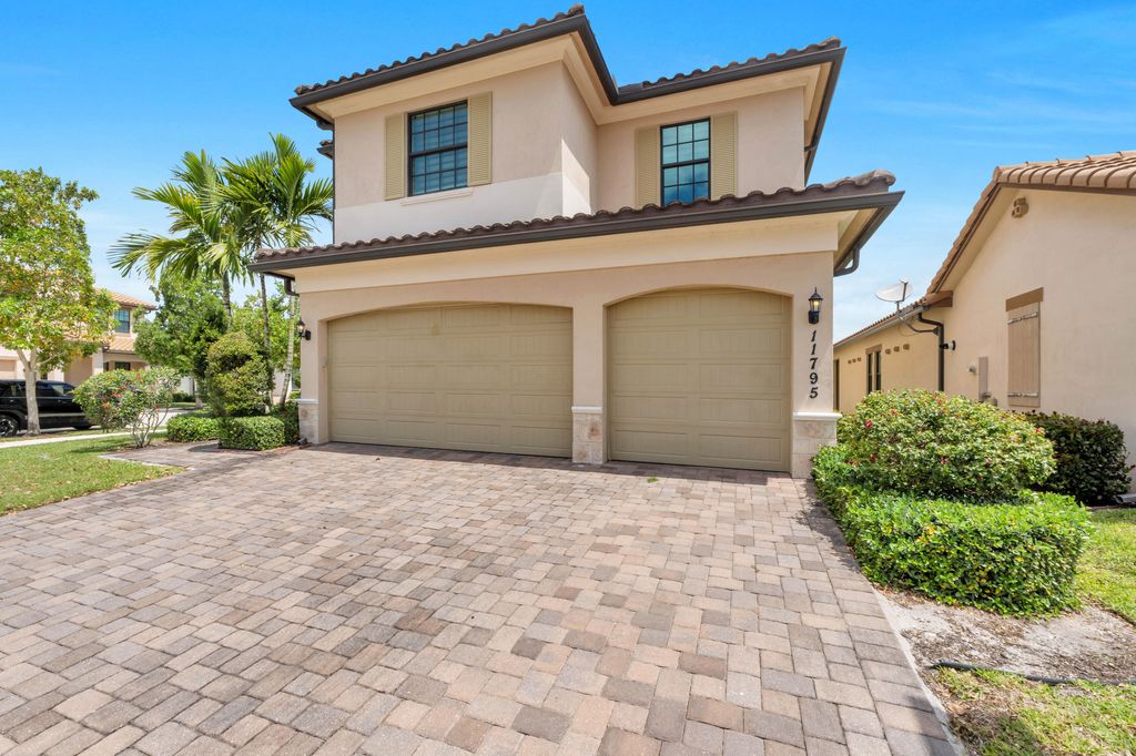 Photo of 11795 Waterway Circle, Parkland, FL 33076 (MLS # B26019507)