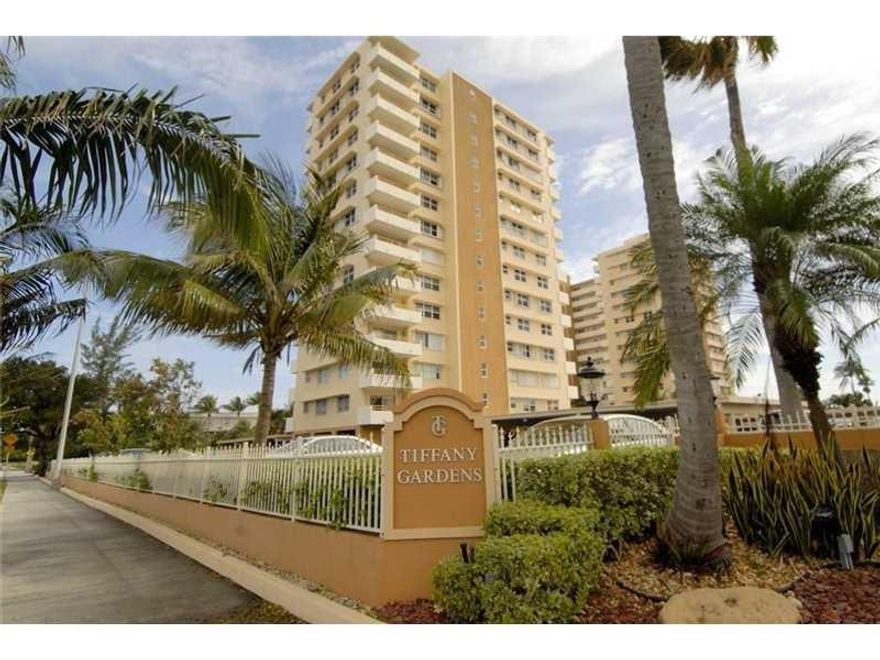 This lovely condo has been completely remodeled with an open kitchen, new baths, floors, & furniture. It comes turnkey with linens, dishes, glasses, pots and pans and silverware. It has a beautiful view of the pool. Enjoy the putting green, shuffleboard, bocce ball,  & assigned covered parking.   Your vacation home is just a short walk to the beach.