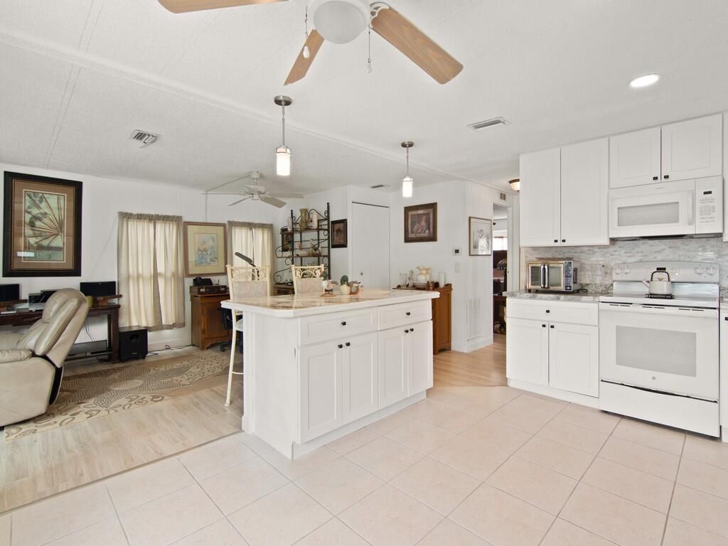 Photo of 8 Brisa Lane, Port Saint Lucie, FL 34952 (MLS # R11167426)