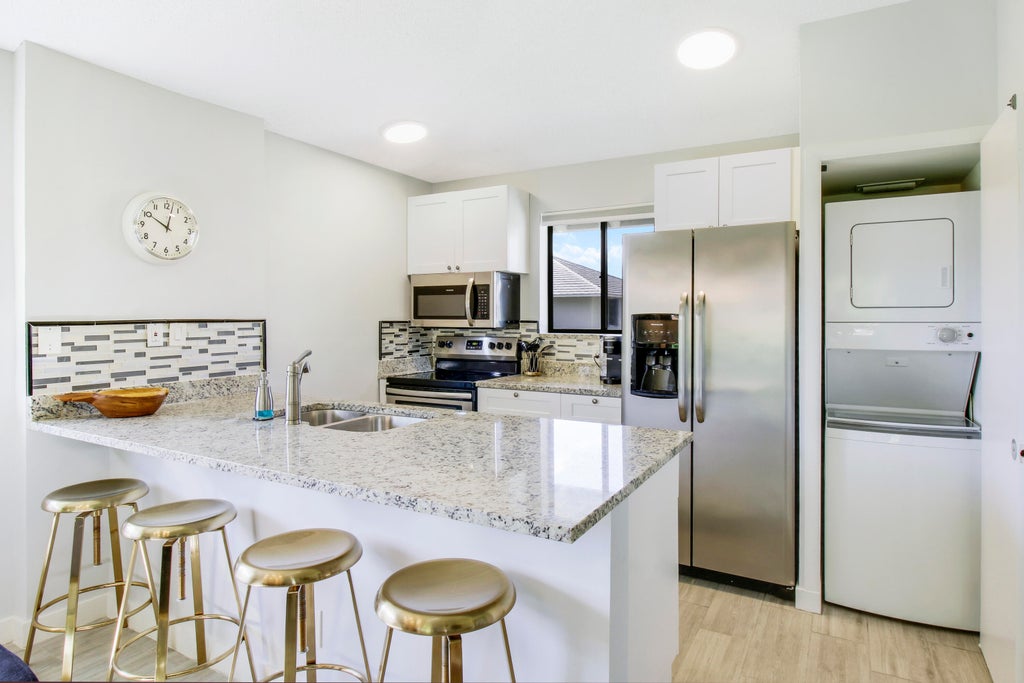 Photo of 108 Club Drive, Palm Beach Gardens, FL 33418 (MLS # R11084458)