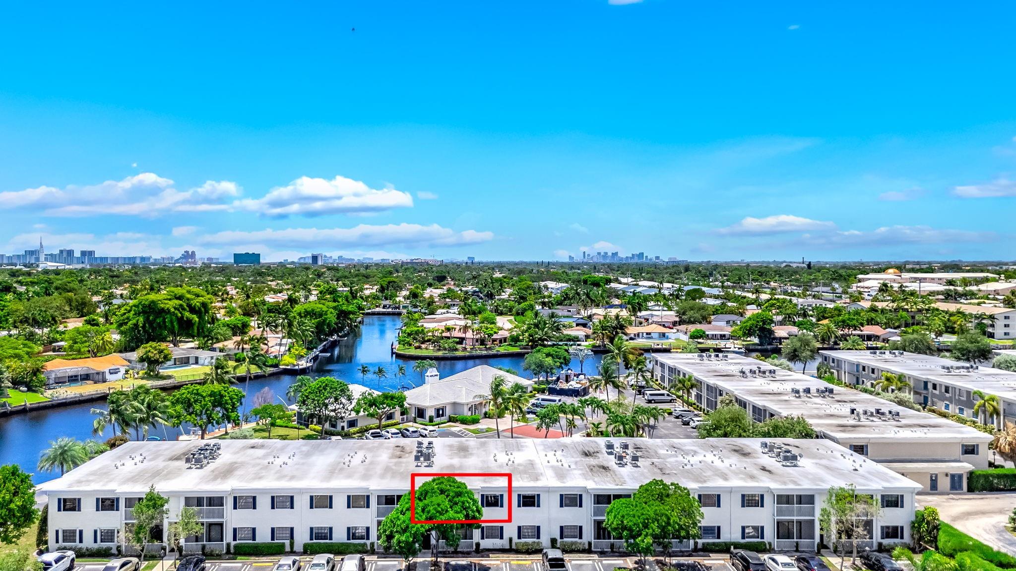Incredible Value for an updated 2 bedroom, 2 bathroom unit in a waterfront community located in East Pompano Beach. The unit is clean and bright with newer hurricane impact windows and doors, fresh paint, brand new carpet installed in both bedrooms (2025), AC installed in 2020, and a in unit washer and dryer. Sip on your coffee as you watch the boats pass by on your new screened in balcony. This unit will not last!