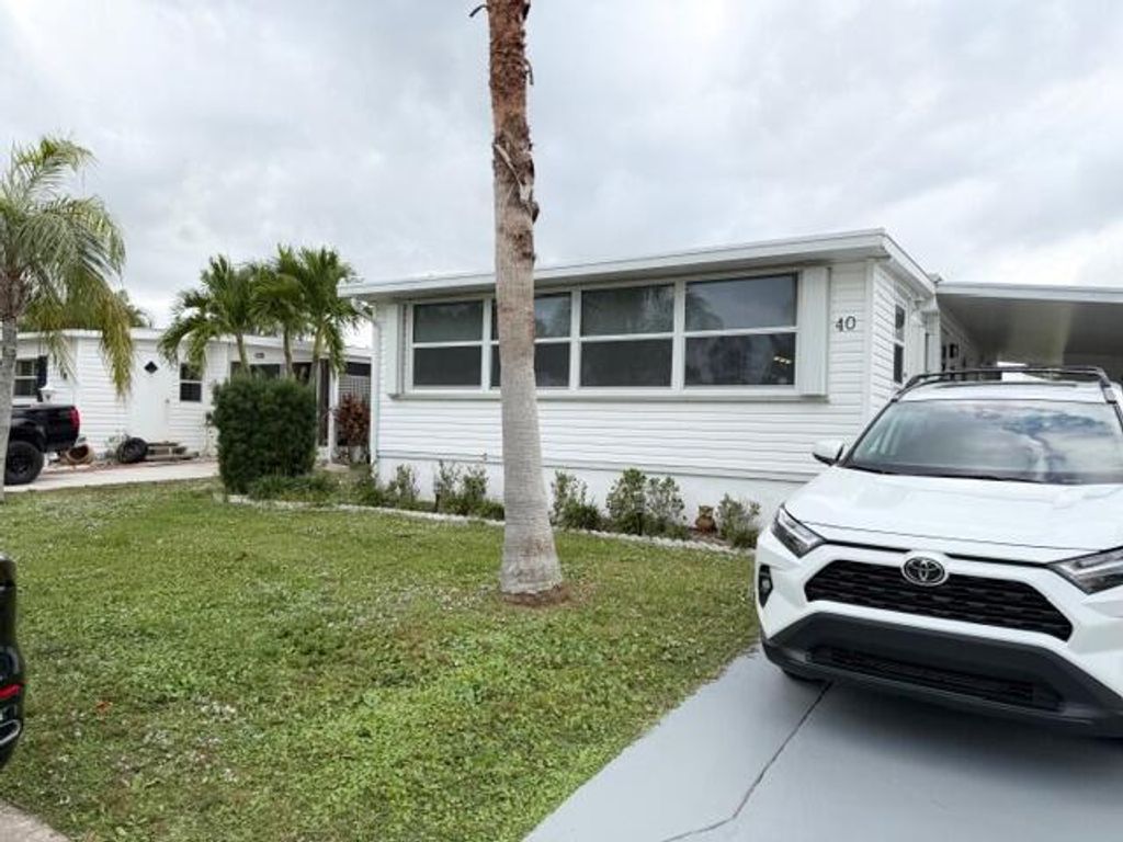 Photo of 40 Florida Way, Port Saint Lucie, FL 34952 (MLS # R11144182)