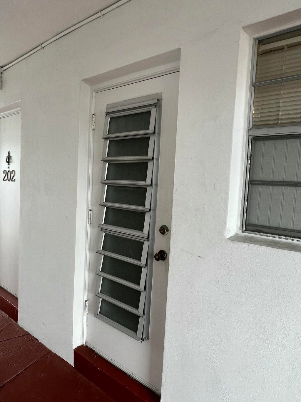 Photo of 1321 NW 43rd Avenue #202, Lauderhill, FL 33313 (MLS # B26039853)