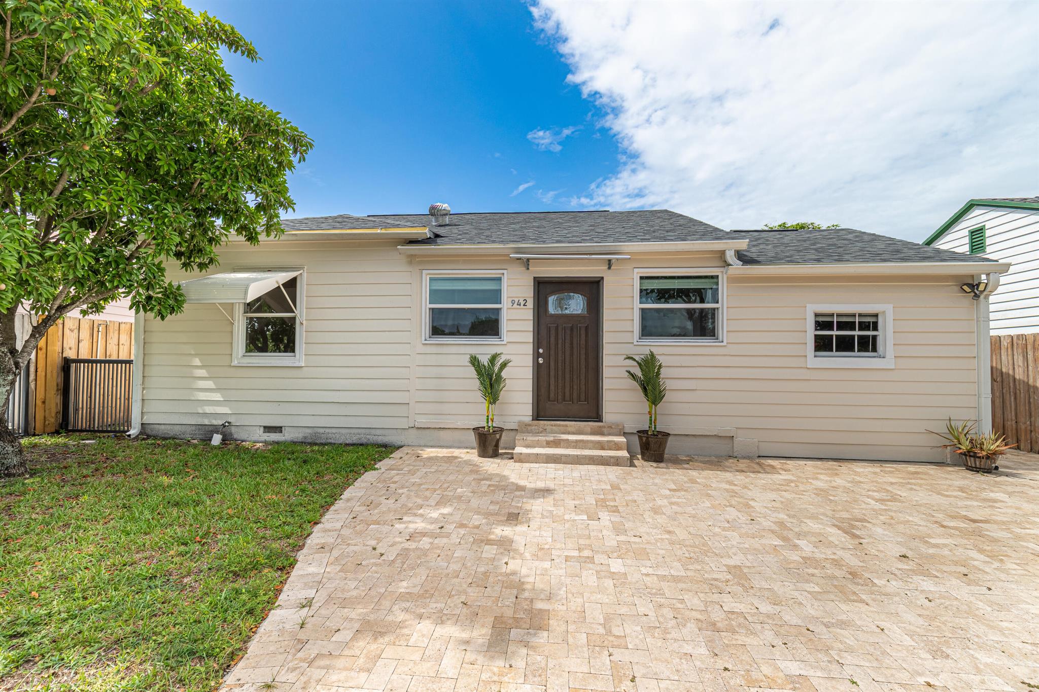 This fully renovated 3-bedroom, 2-bath home is located in the highly desirable Pineapple Park neighborhood of West Palm Beach. The modern split layout, paired with updated kitchen and baths, creates a home that is both functional and invitingEnjoy the private backyard on an oversized lot, perfect for entertaining or relaxing. Additional features include a gas range, tankless water heater, new roof (2024).Nestled on a quiet street in historic Pineapple Park, you'll be just minutes from Downtown West Palm, the vibrant new NORA district, beaches, Grandview Market, PBI Airport, and the Brightline -- all while enjoying the charm of a peaceful neighborhood setting.*Photos are virtually staged with furniture