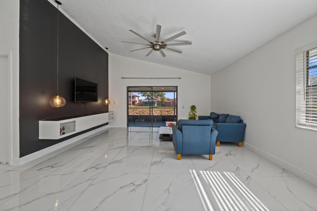 Photo of 5310 Kim Court, West Palm Beach, FL 33415 (MLS # R11093943)