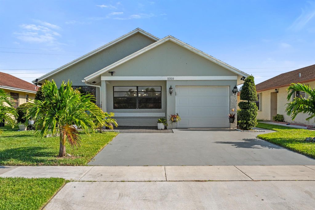 Photo of 5310 Kim Court, West Palm Beach, FL 33415 (MLS # R11093943)