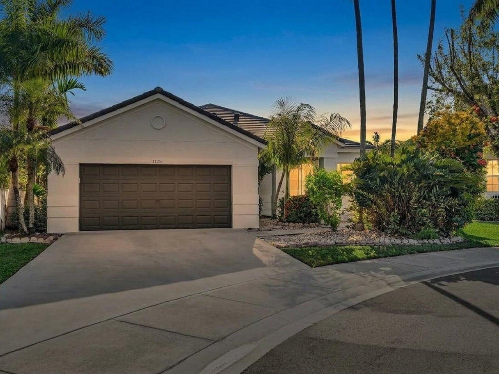 Photo of 1125 Sunflower Circle, Weston, FL 33327 (MLS # B26085347)