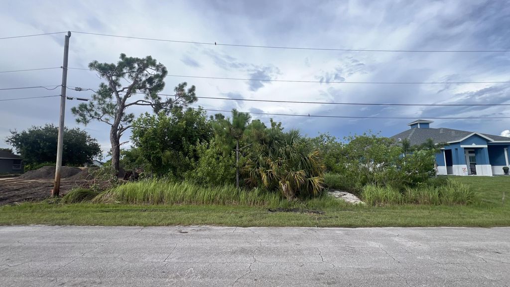 Photo of 2607 SW Fair Isle Road, Port Saint Lucie, FL 34987 (MLS # R11015683)