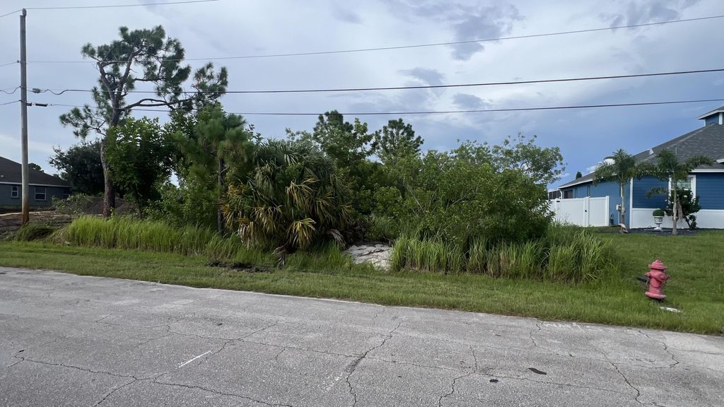 Photo of 2607 SW Fair Isle Road, Port Saint Lucie, FL 34987 (MLS # R11015683)