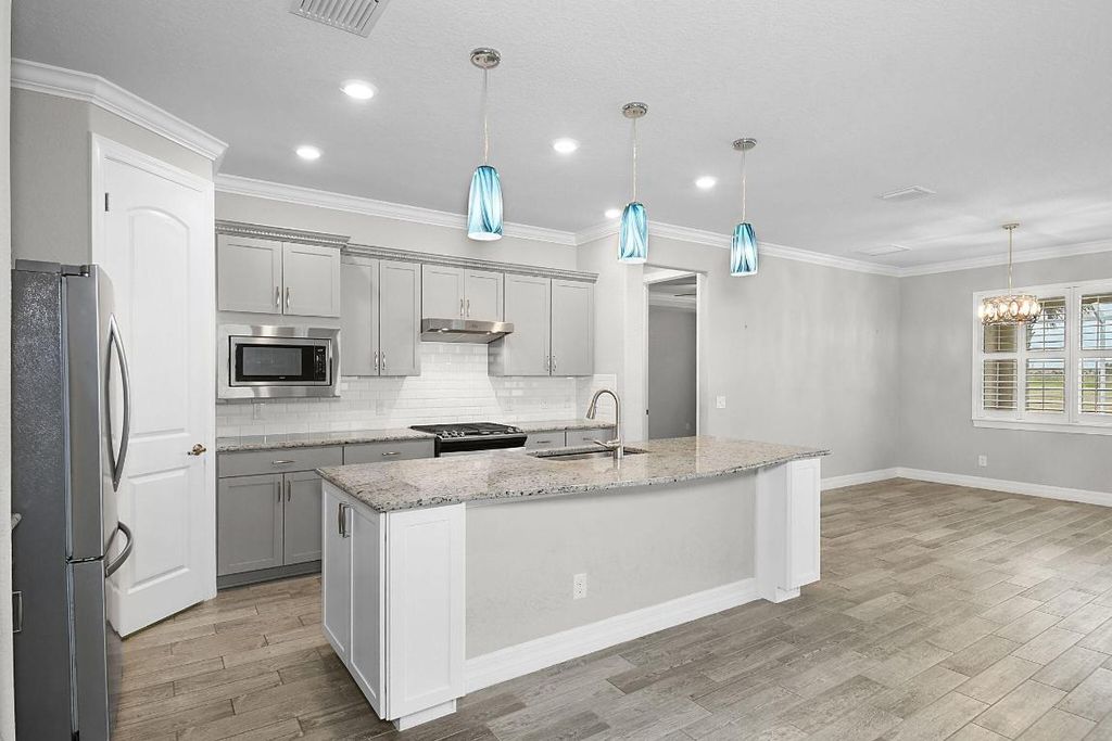 Photo of 12880 SW Aureolian Lane, Port Saint Lucie, FL 34987 (MLS # R11124369)