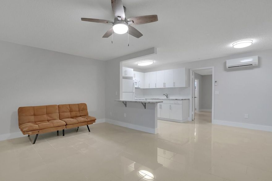 Nestled in the vibrant heart of trendy Lake Worth Beach, this meticulously updated one-bedroom, one-bath apartment offers a seamless blend of modern elegance and coastal living. Boasting exquisite tile flooring and granite countertops, this inviting abode exudes sophistication and style. Ideally situated close to the beach and 95, residents can indulge in the ultimate beach lifestyle and easy access to all S. Florida has to offer. Embrace the convenience of having the option to install a washer and dryer within the unit or opt for a fully furnished turnkey experience. With its prime location, this gem promises an unparalleled opportunity to immerse oneself in the area's dynamic social scene, world-class dining, and endless recreational pursuits. Move in First Month rent and security.