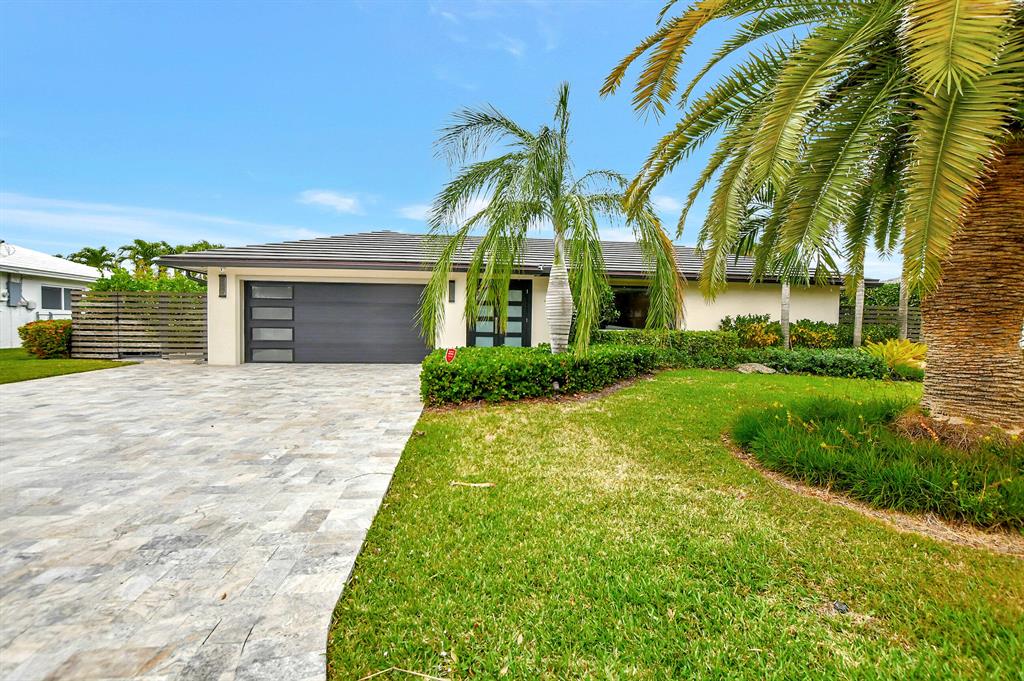 Welcome home! Gorgeously updated, impeccably maintained contemporary 3 BR, 2 BA waterfront turnkey smart home in Bel Marra of East Boca. Private dock sits on 85' of water frontage on a wide canal, with no fixed bridges, and direct intracoastal and ocean access, and includes a 16K lb elevator boat lift. Split floor plan with plenty of space inside and out for entertaining. Private backyard oasis with stunning saltwater pool and sun shelf, & covered patio area. Featuring: impact glass windows & French doors, whole house standby generator, natural gas, high end Wolf and LG appliances, luxury light fixtures, and lushly landscaped front and back yards. Oversized 2 car garage with epoxy floors and storage cabinets. Furniture and decor are negotiable. Minutes to the beach, Mizner, & Atlantic Ave