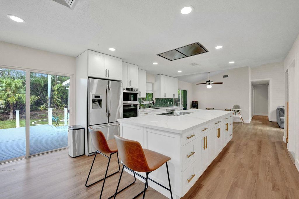 Photo of 12837 164th Court N, Jupiter, FL 33478 (MLS # R10869011)