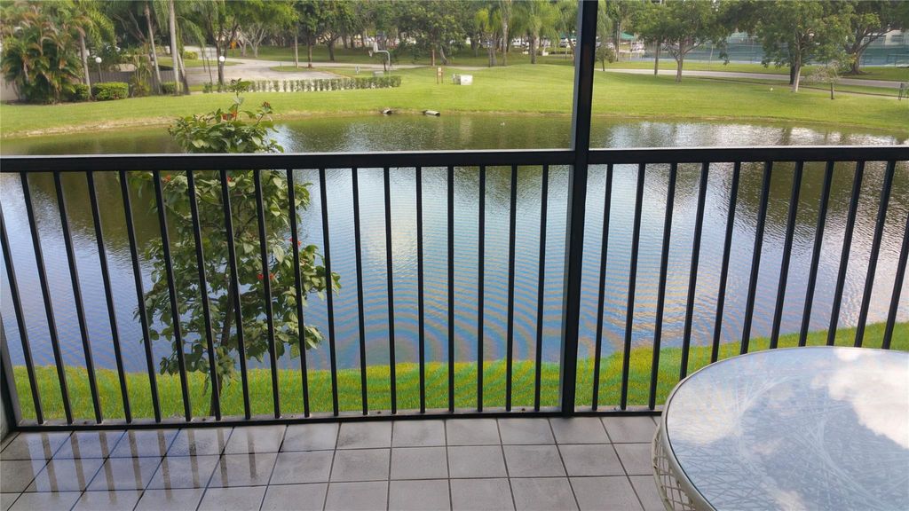 Photo of 2334 S Cypress Bend Dr #210, Pompano Beach, FL 33069 (MLS # F10392182)