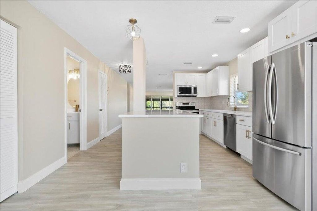Photo of 13921 Royal Palm Court #D, Delray Beach, FL 33484 (MLS # B26024690)