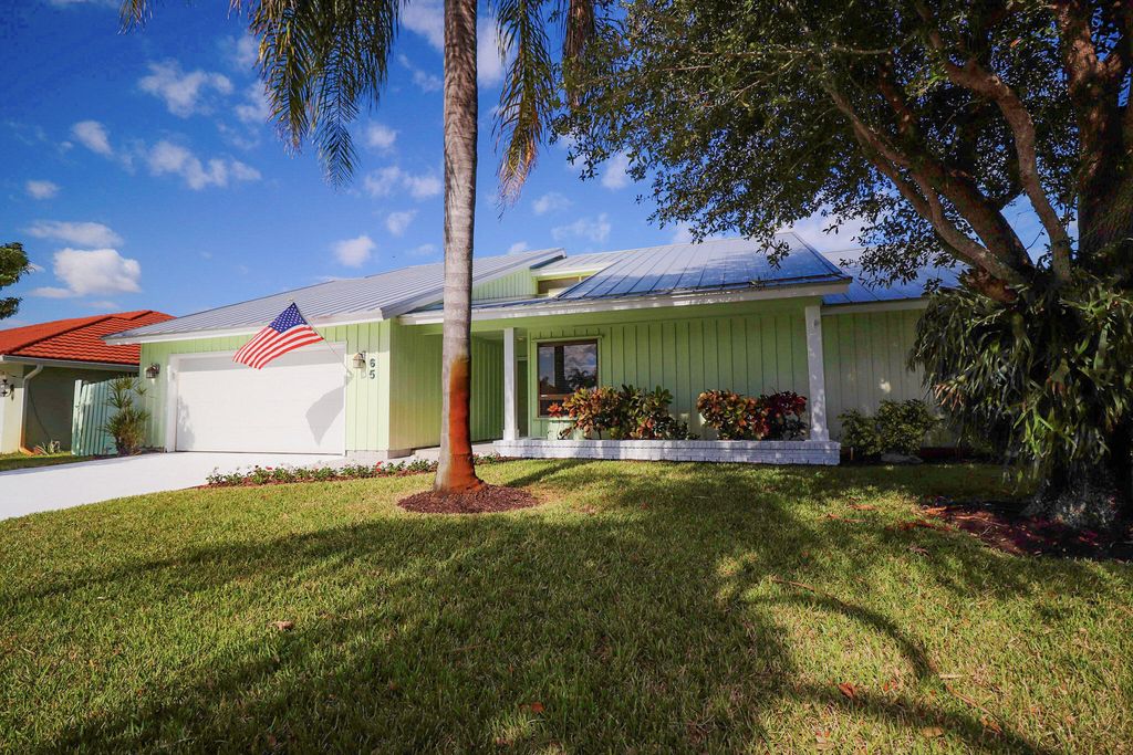 Photo of 65 W Pinehill Trl TRL W, Tequesta, FL 33469 (MLS # B26029930)