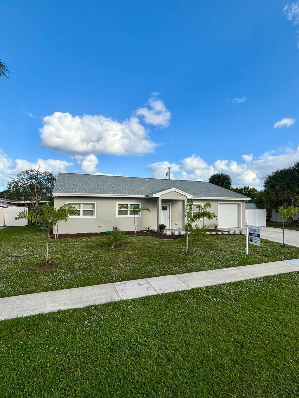 Photo of 9122 Bamboo Drive, Palm Beach Gardens, FL 33410 (MLS # R11028973)