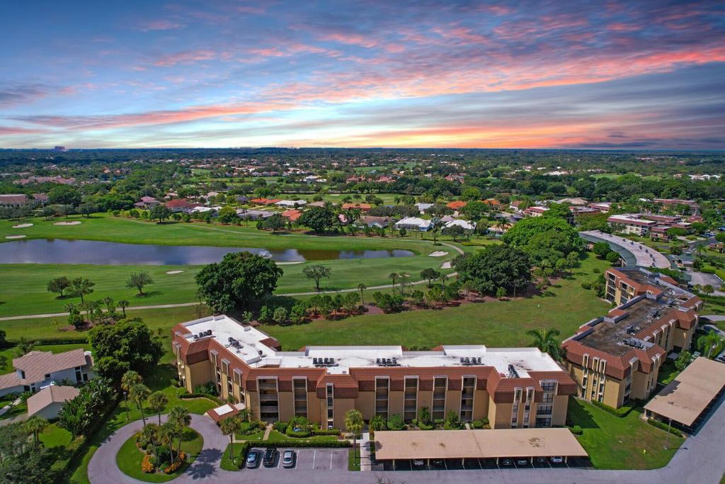 Photo of 5350 Woodland Lakes Drive #111, Palm Beach Gardens, FL 33418 (MLS # R11118879)