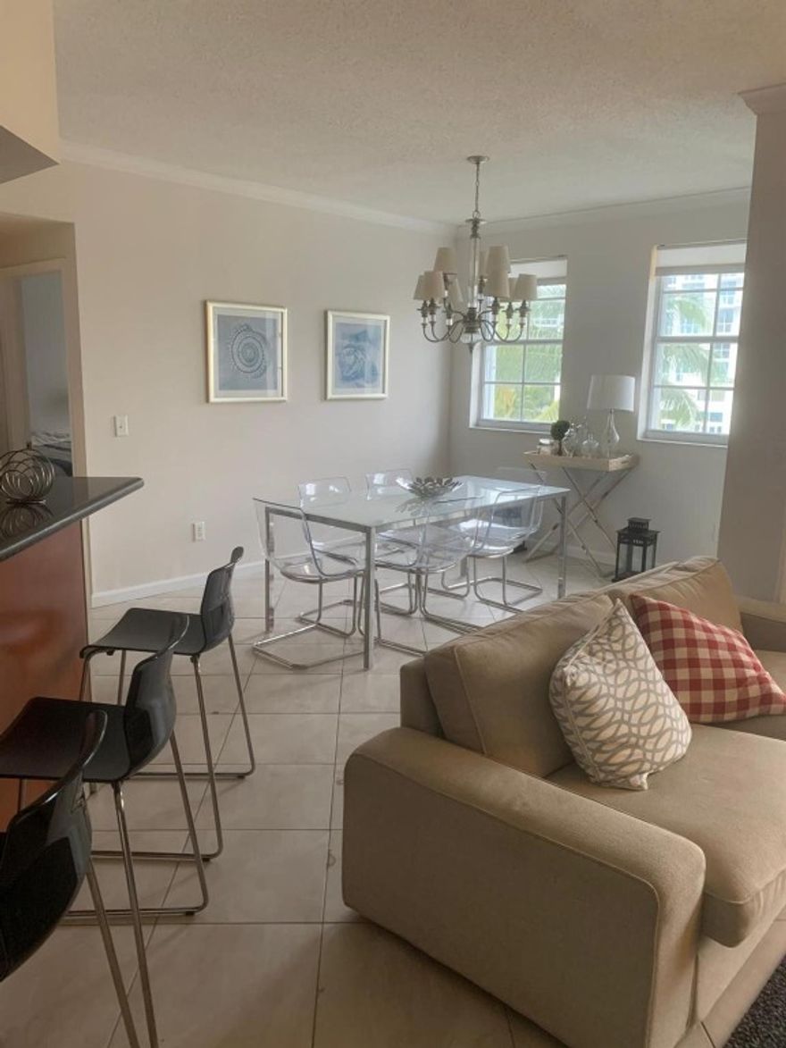 Fabulous 3 Bedroom /2 bath +Den in Village by the Bay!! Water views from every room. Spacious open layout with carpet and freshly painted. Amenities include clubhouse, pool, tennis court and fitness room. Near all of the shopping and restaurants in Aventura! Great Location !!! Ask about short term rentals and Pets A must see!!