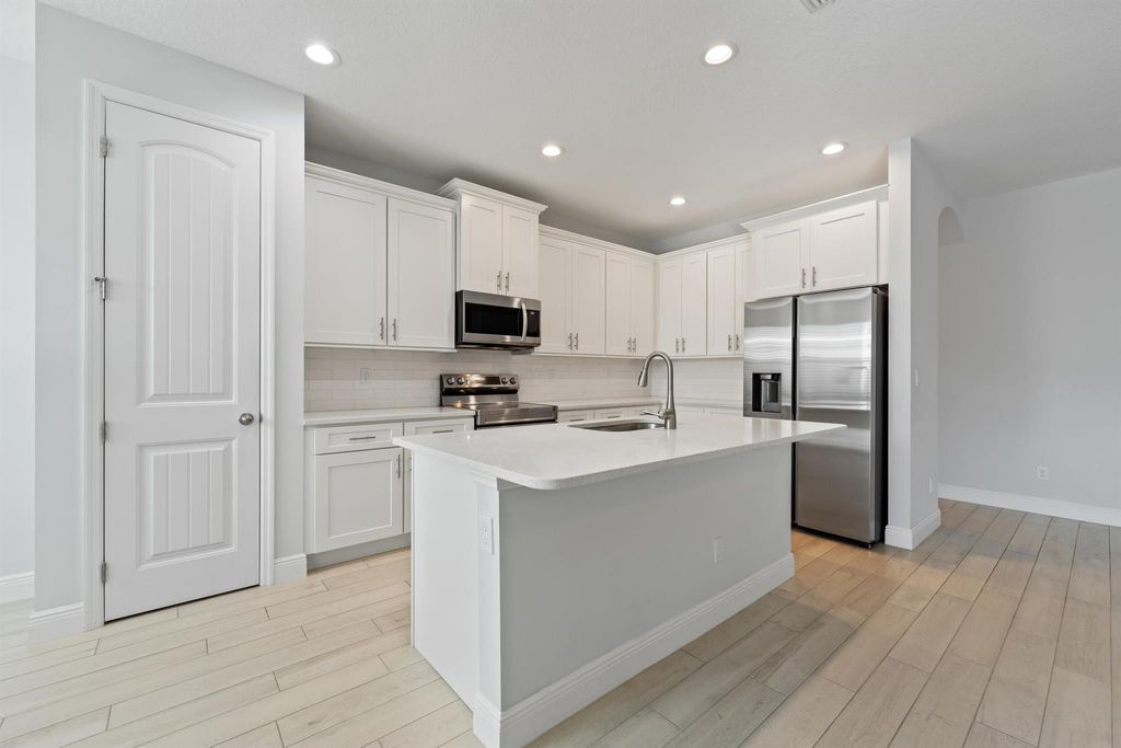 Photo of 476 SW Crawfish Drive, Port Saint Lucie, FL 34953 (MLS # R11145645)