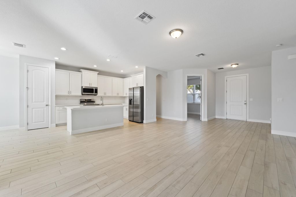 Photo of 476 SW Crawfish Drive, Port Saint Lucie, FL 34953 (MLS # R11145645)