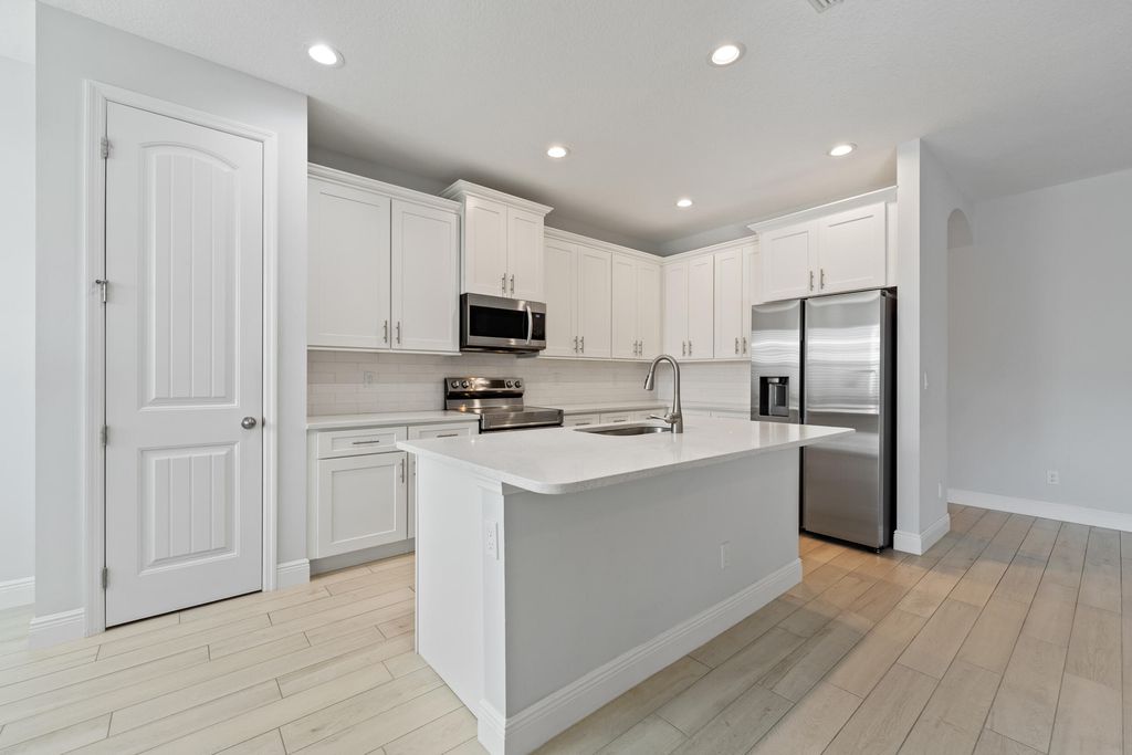 Photo of 476 SW Crawfish Drive, Port Saint Lucie, FL 34953 (MLS # R11145645)