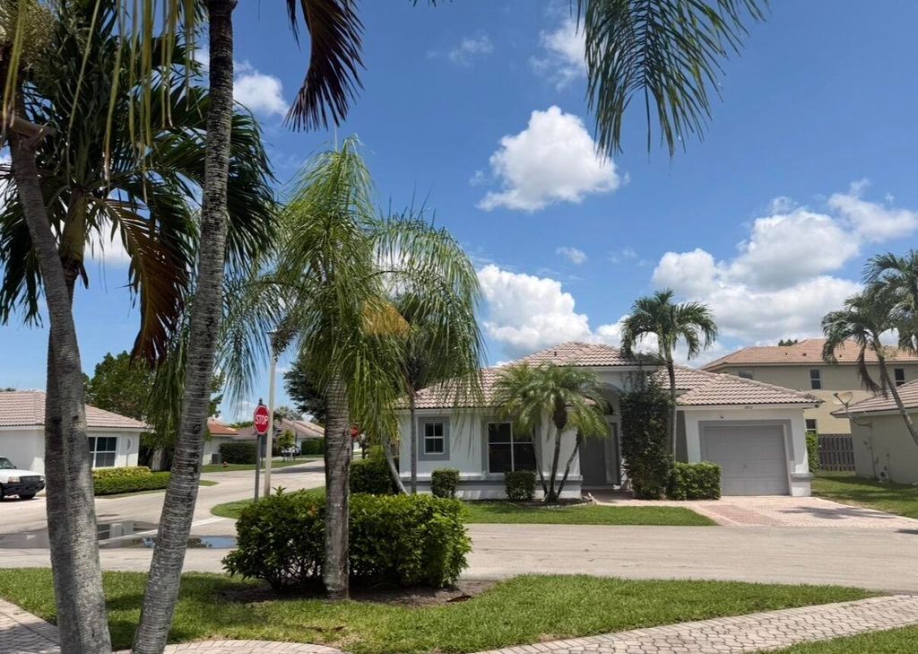 Photo of 1852 Capeside Circle, Wellington, FL 33414 (MLS # B26040712)
