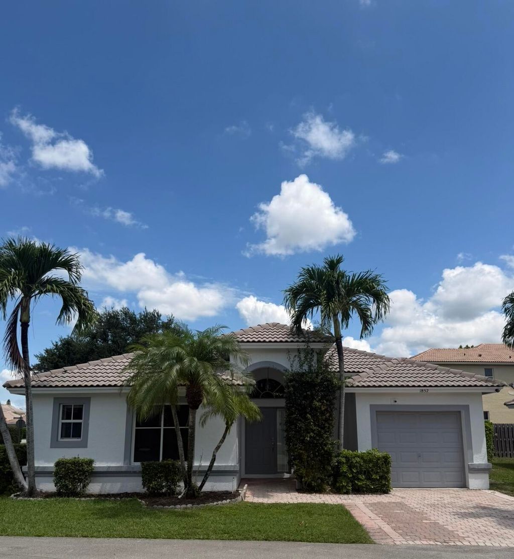 Photo of 1852 Capeside Circle, Wellington, FL 33414 (MLS # B26040712)