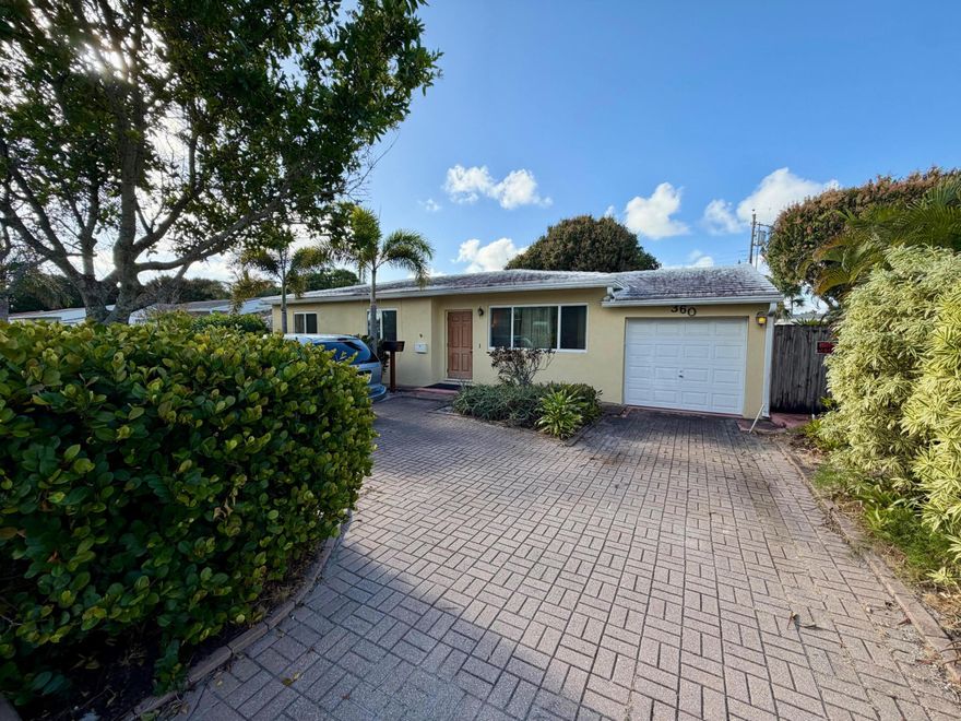 Opportunity awaits in this solid CBS construction home in the heart of West Palm Beach. This 3-bedroom, 2-bathroom residence with an attached 1-car garage offers great potential for buyers looking to update and make it their own. The home features beautiful terrazzo floors throughout and a functional floor plan, providing a strong foundation for renovation or personalization. It offers great bones and endless possibilities to create your ideal Florida home. Perfectly situated in a convenient location, the property is within walking distance to South Olive Elementary and just minutes from shopping, dining, parks, and major roadways. Enjoy being close to the Intracoastal Waterway and Flagler Drive, ideal for scenic walks, biking, and waterfront views. Whether you're a homeowner ready to  an investor looking for potential, this home presents a fantastic opportunity in a desirable West Palm Beach location.