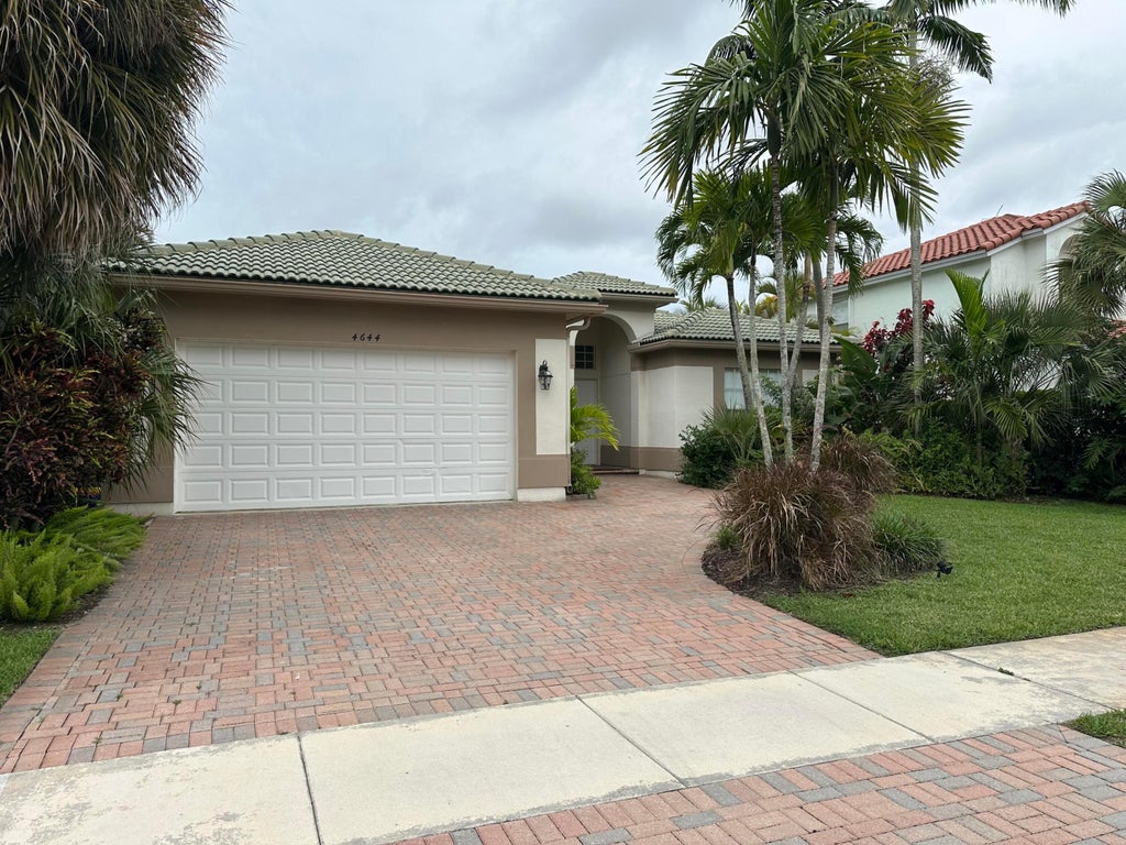 Photo of 4644 WINDWARD COVE Lane N, Wellington, FL 33449 (MLS # B26080648)