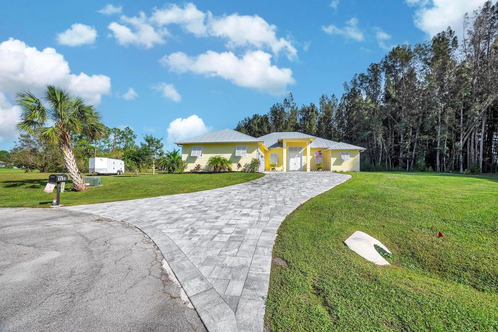 Photo of 1530 Pineburke Lane, Fort Pierce, FL 34947 (MLS # R11039945)