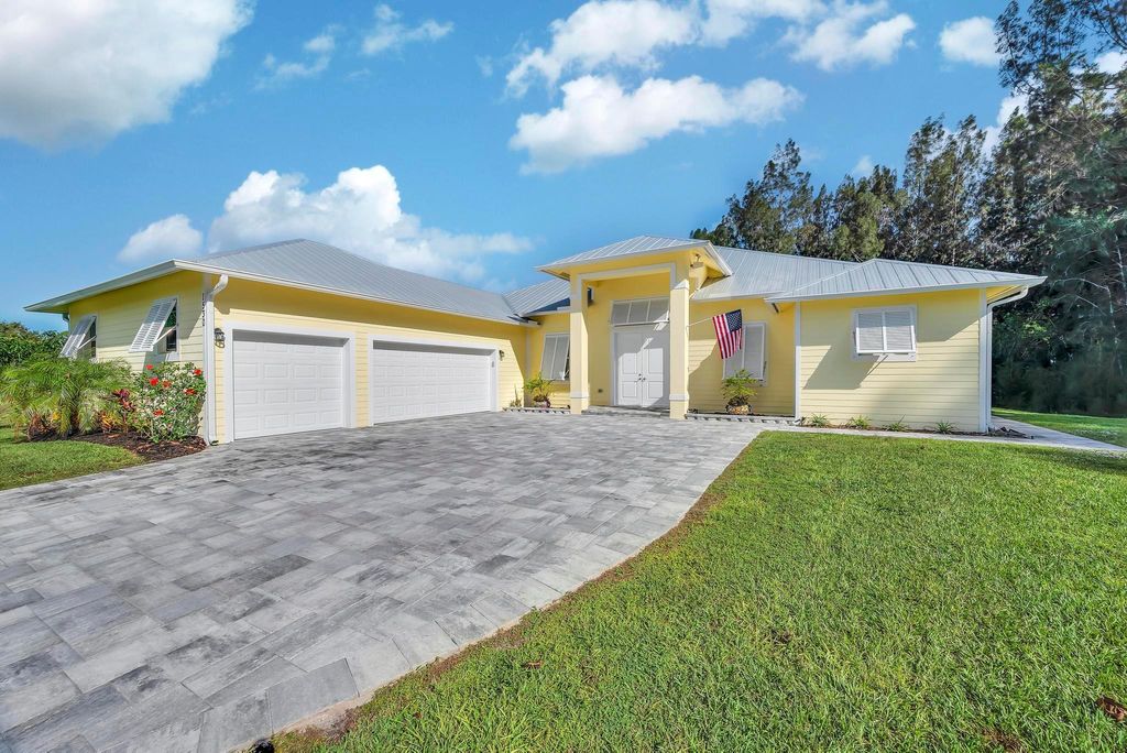 Photo of 1530 Pineburke Lane, Fort Pierce, FL 34947 (MLS # R11039945)