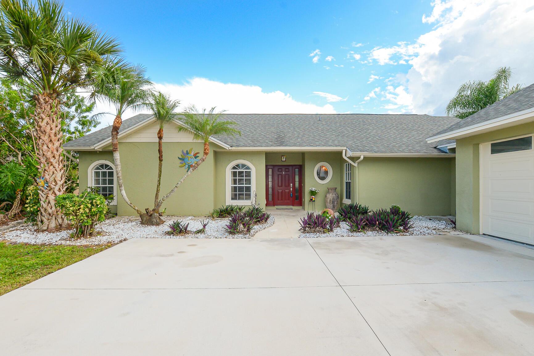 Beautiful Waterfront Pool home awaits you with 4 bedrooms 3 baths and 2 car garage. Great home for entertainment as it has a great bar, and pool, new carpeting, 2020 roof, and 2021 A.C units. This is a move in ready home in a great gated community. This home features natural gas for water heater and heated pool and fantastic floor plan for you to enjoy. This home will excite you. What a well priced home this is. I challenge you to find a better buy out there !!